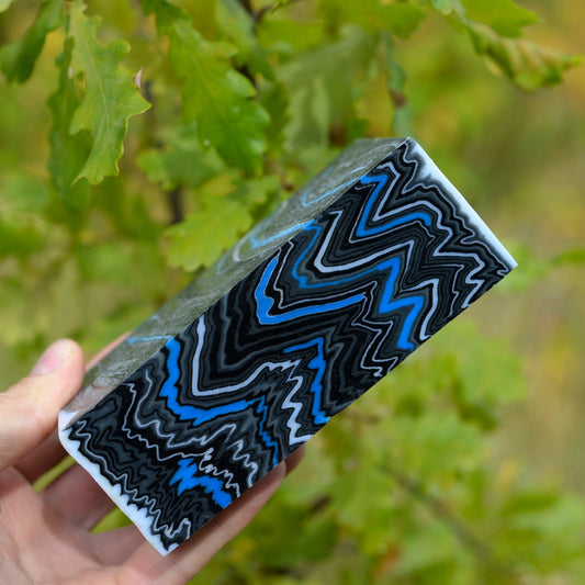 Handmade micarta-style composite block in blue, black and white colors for custom knife handle making #9