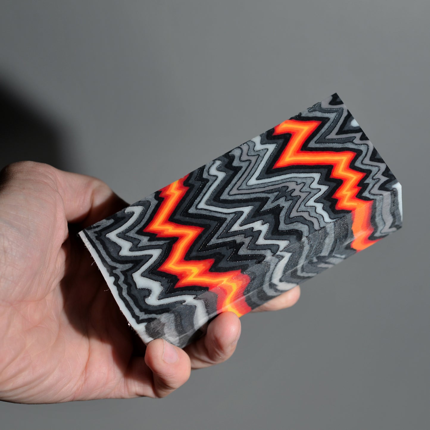 Handmade micarta-style composite block in gray, black and neon orange colors for knife handle making #05