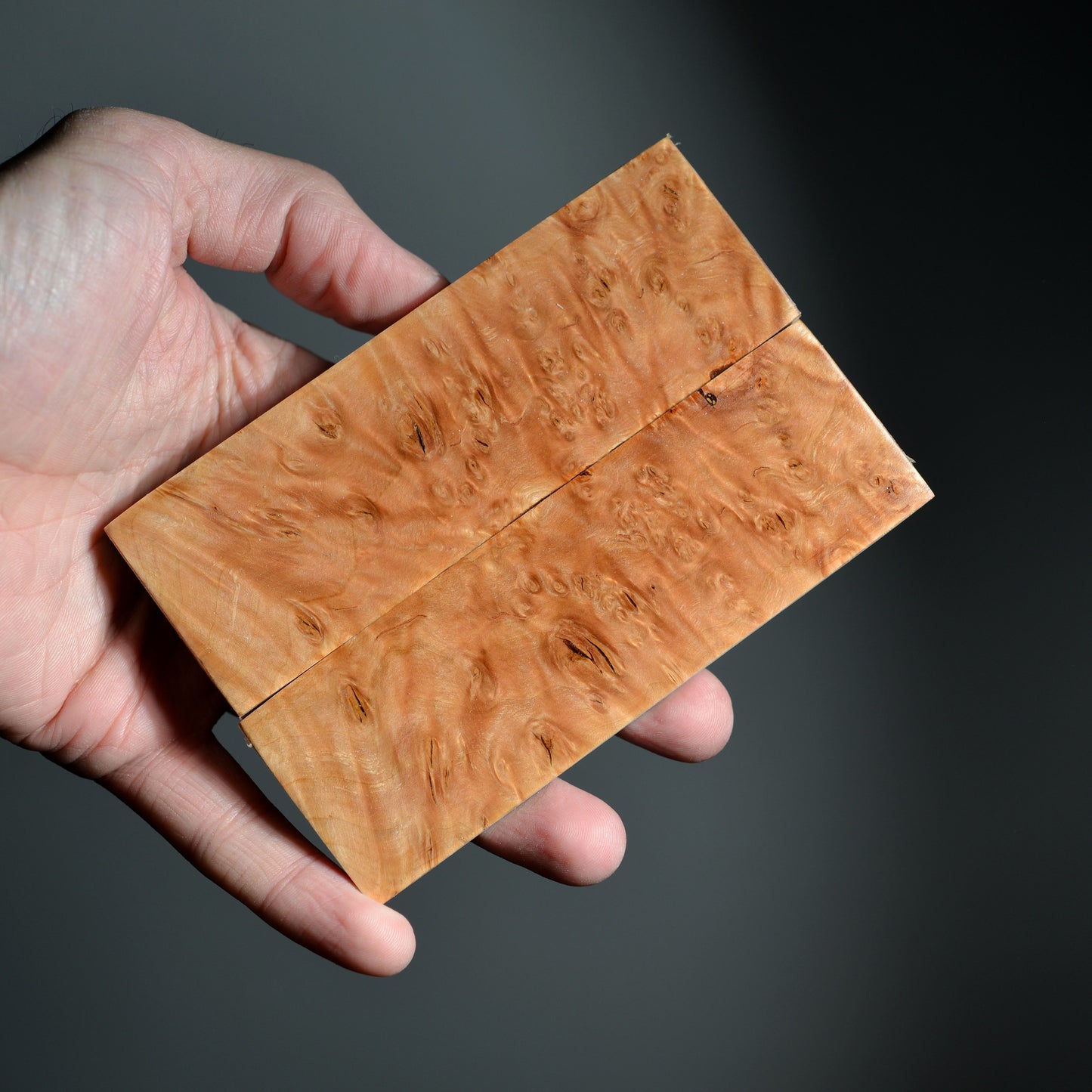 Stabilized alder burl wood scales with soft natural grain pattern