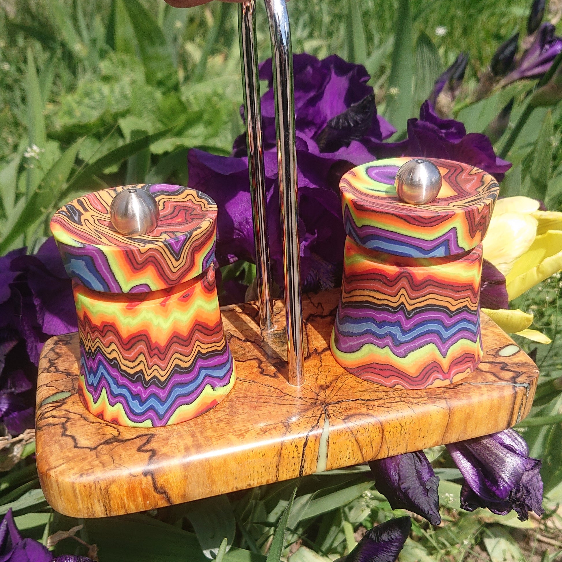 Custom Peugeot salt and pepper mill set with colorful micarta composite bodies and stabilized spalted beech wood stand, handmade modification