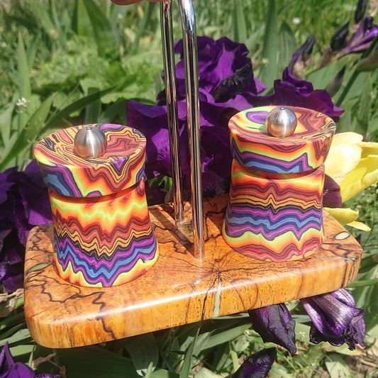 Custom Peugeot salt and pepper mill set with colorful micarta composite bodies and stabilized spalted beech wood stand, handmade modification