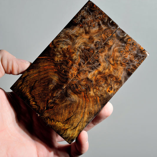 Bookmatched pair of premium stabilized Alder Burl knife handle scales with intense burl figure and rich brown-orange tones.