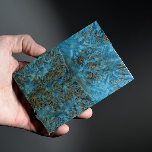 Pair of stabilized alder burl knife scales dyed blue with detailed burl figure