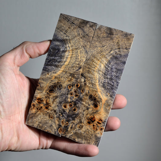 Bookmatched pair of stabilized wood knife scales with natural golden color and dark black burl spots